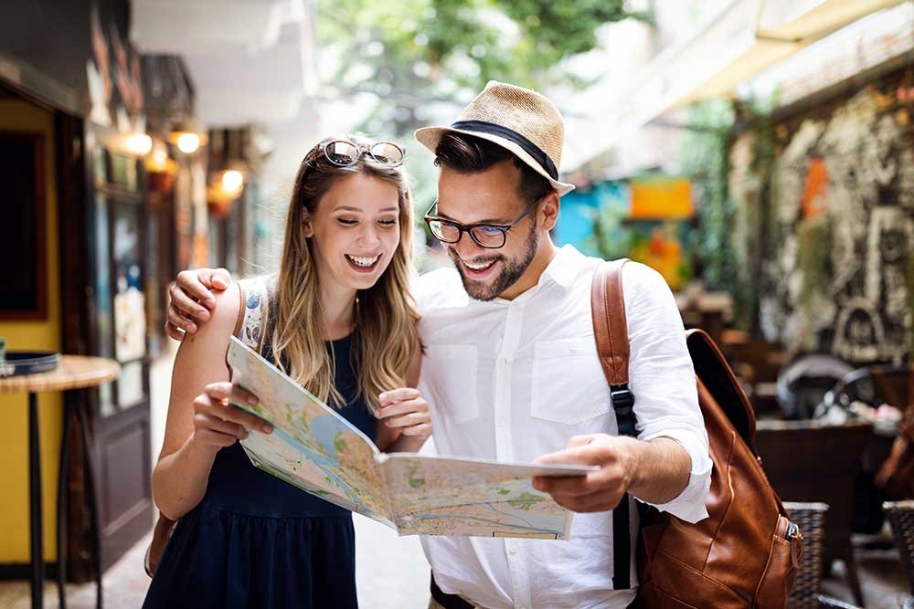 tourist couple traveling travel walking on street small